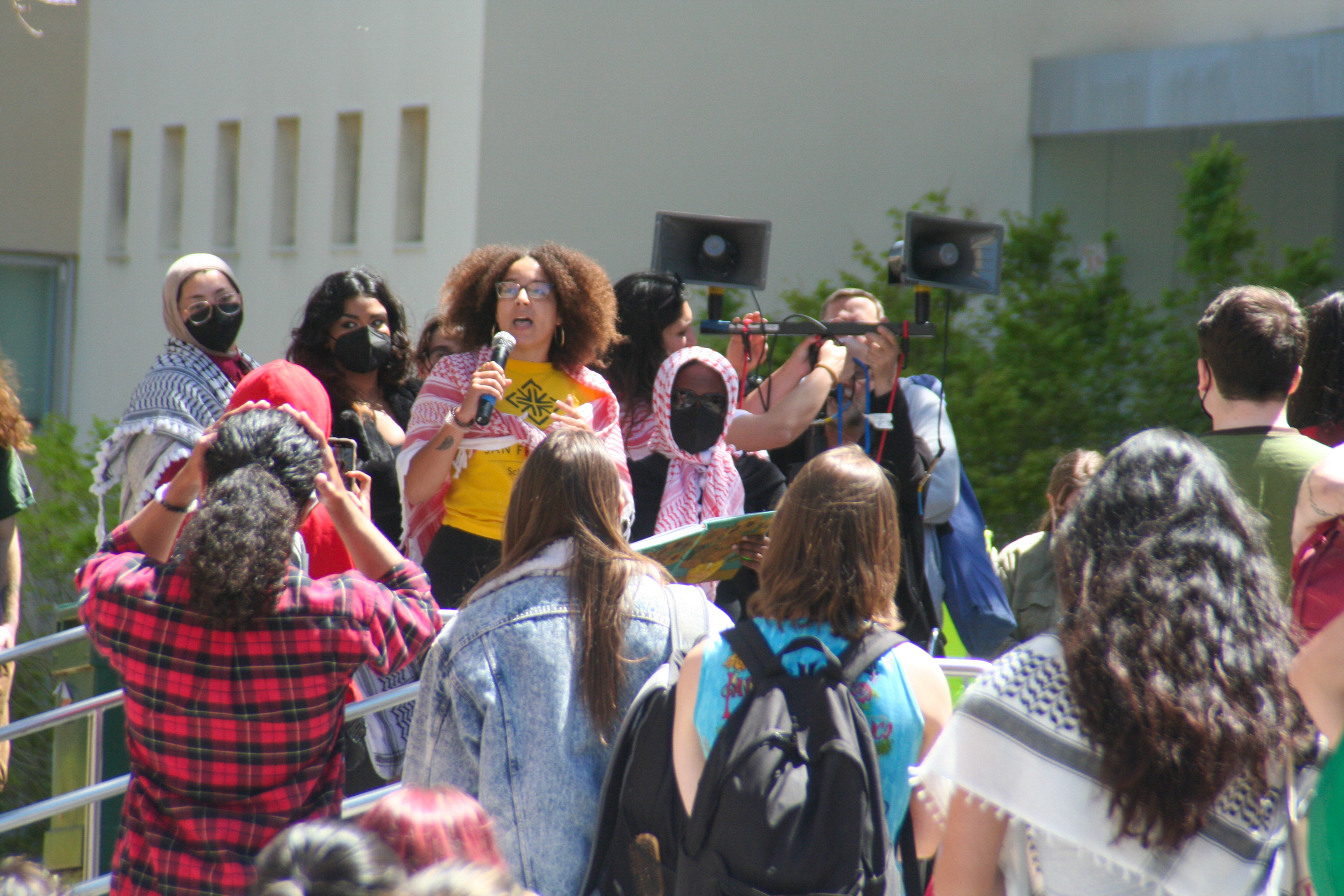 a speaker, engaging the crowd